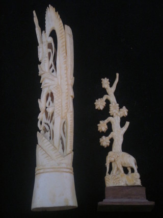A carved section of ivory decorated a figure of a Warrior 8" and  a carved ivory figure of an elephant by a tree 5"