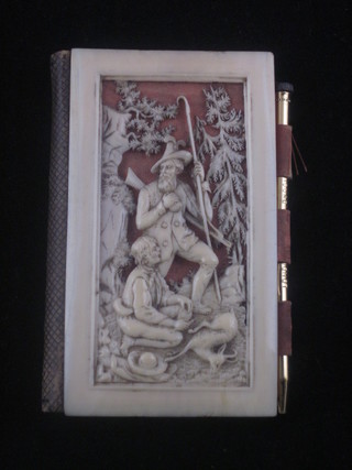 An aide memoir with pierced and carved cover
