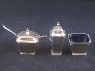 A square Art Deco silver 3 piece condiment set comprising  mustard, salt and pepper, Birmingham 1934 with Jubilee  hallmark 3 ozs