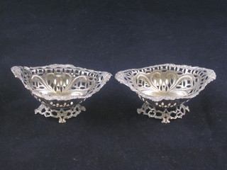 A pair of Victorian pierced silver boat shaped dishes, London 1893 and 1894, 2 ozs