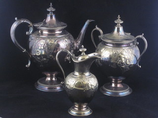 A circular 3 piece engraved silver plated coffee service comprising coffee pot, twin handled sugar bowl and cream jug