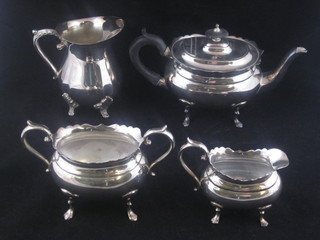 A silver plated 3 piece Bachelor's tea service of oval form  comprising teapot, milk jug and sugar bowl and 1 other cream  jug