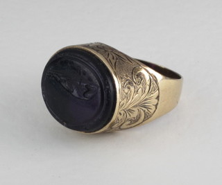 A 9ct gold signet ring set an intaglio carved stone
