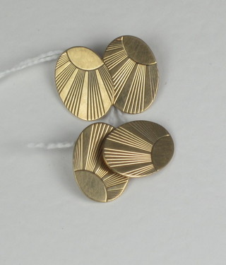 A pair of 9ct oval gold cufflinks