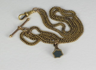 A gilt metal Langtree watch chain hung a seal