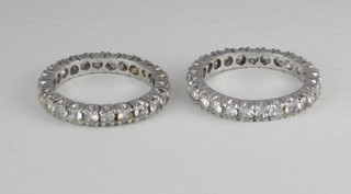 2 white metal full eternity rings set white stones