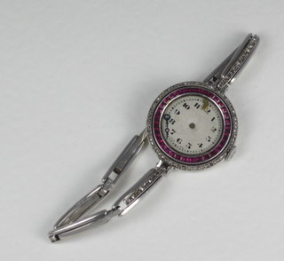 A lady's cocktail wristwatch set white and red stones