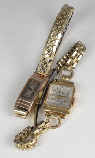 A lady's Orlux wristwatch and 1 other lady's watch contained in  a gold cases