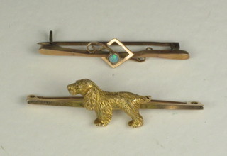 A 9ct gold bar brooch in the form of standing Spaniel and 1 other gold bar brooch