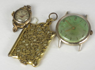A pierced gilt metal cased aide memoir together with a Timex wristwatch and a lady's Najoix watch