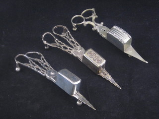 A pair of 19th Century silver plated candle snuffers, f, and 1 other pair