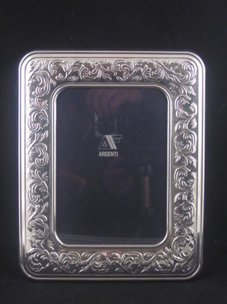 A modern silver easel photograph frame 10" x 8"
