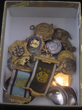 2 gilt metal buffalo jewels, 5 Castle National Dance Championship medals and 5 silver plated darts teaspoons