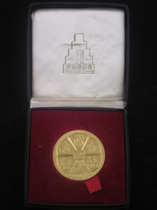 An Iranian gold metal coin 1 1/2" diam.   ILLUSTRATED