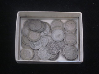 A quantity of silver sixpences