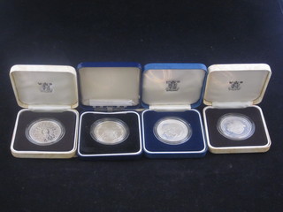 A Queen Elizabeth The Queen Mother 80th Birthday silver proof crown, 2 Charles and Diana silver proof crowns and a Falklands  Liberation silver proof crown