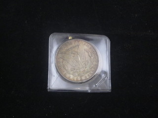 A 1780 Maria Theresa coin together with an American 1886  dollar