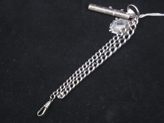 A silver watch chain medallion, a silver curb link watch chain, a silver dress ring and a silver tooth pick case