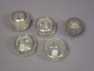 3 circular cut glass salts with silver mounts, a match striker and  an embossed Eastern white metal pepperette