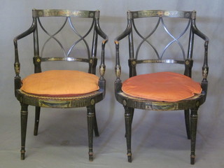 A handsome pair of Victorian ebonised and painted tub back  chairs with lattice work backs and woven cane seats, raised on  turned and fluted supports, painted throughout   ILLUSTRATED