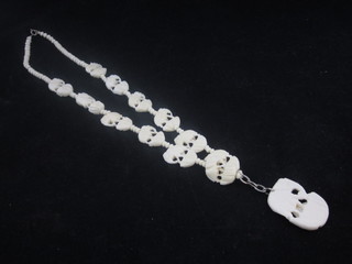 A carved ivory necklace
