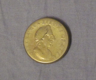 A gilt metal Roman coin