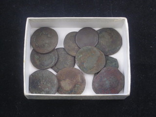 A collection of various bronze Roman coins