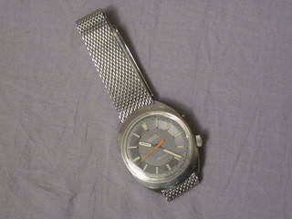 A 1960's Omega Chronostop wristwatch contained in a chrome case, 1 button missing,