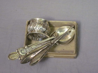 A silver napkin ring, 4 silver spoons and 2 silver handled  manicure implements, 4 ozs