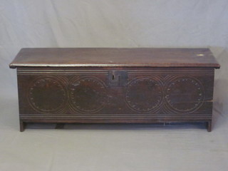A 17th/18th Century coffer of panelled construction with hinged lid 44"