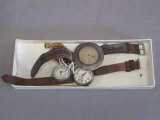 A lady's gold cased wristwatch, a gentleman's gold cased wristwatch, 3 silver cased wristwatches and a dress watch  contained in a gun metal case