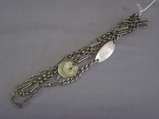 A silver identity bracelet and 3 silver Albert chains