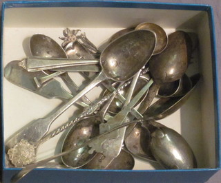 A collection of various silver spoons