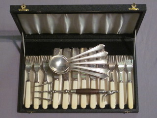 A set of 6 silver plated fish knives and forks, 3 silver plated  soup spoons and a bread fork the handle decorated a kangaroo