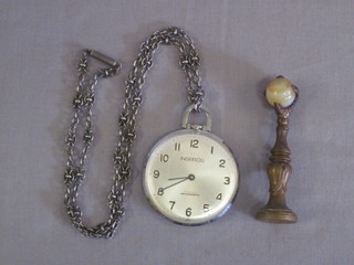 An Ingasol open faced dress pocket watch contained in a stainless steel case, together with a gilt metal seal in the form of a  clenched claw