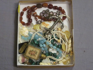 A malachite pendant, a hardstone brooch in the form of an  anchor and other costume jewellery