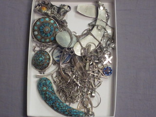 A collection of silver chains etc