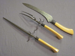 A Victorian 3 piece carving set comprising carving knife, steel and fork with ivory handles, by Wil & Finck