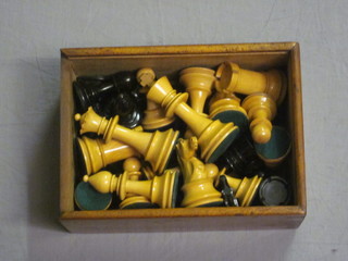 A Staunton's chess set, complete and contained in a small  wooden box