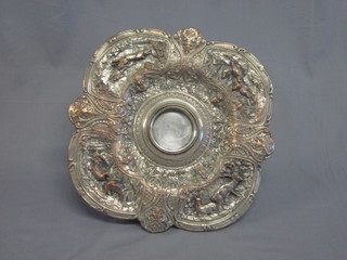 A circular embossed silver plated table centre piece decorated animals 14"