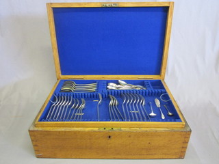 A Mappin & Webb part canteen of silver plated flatware  contained in an oak canteen box