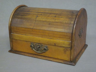 An Edwardian oval shaped oak stationery box the base fitted a  drawer with calendar 12"