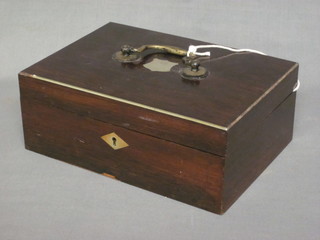 A 19th Century rectangular rosewood trinket box with hinged lid  and metal diamond shaped escutcheon 9 1/2"