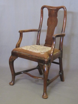 An 18th/19th Century Queen Anne style slat back carver chair  with upholstered seat, raised on turned supports with wavy H  framed stretcher, on cabriole supports