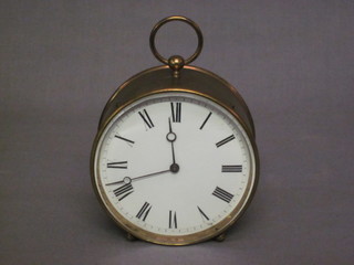 A 19th Century travelling clock with enamelled dial and Roman numerals contained in a brass drum shaped case 4"