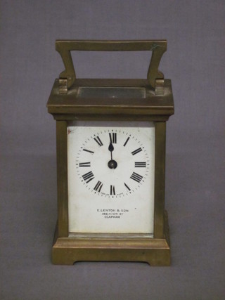 A 19th Century French 8 day carriage clock with enamelled dial  and Roman numerals, contained in a gilt metal case by E Lenton  & Sons, chips to dial, glass to front and second hand missing,   ILLUSTRATED