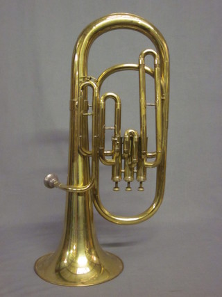 A brass Tuba marked Lark M4051