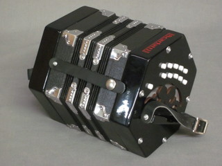 A modern concertina by Scarlatti with 21 buttons