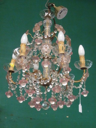 A pair of 6 light electroliers hung pink and clear glass drops