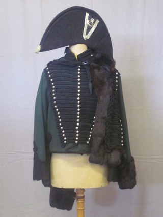 A reproduction Officer's Uniform of The 95th Rifles comprising bicorn hat, tunic, pelisse and pair of overalls, used in the filming  of the television series Sharpe